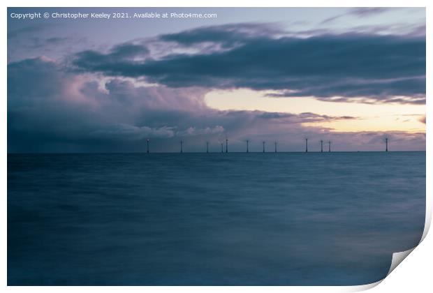 Cloudy sunrise at Caister, Norfolk Print by Christopher Keeley