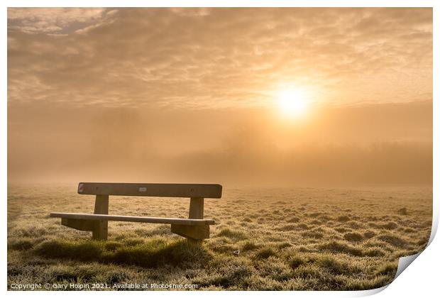 A bench at sunrise on a foggy winter morning Print by Gary Holpin