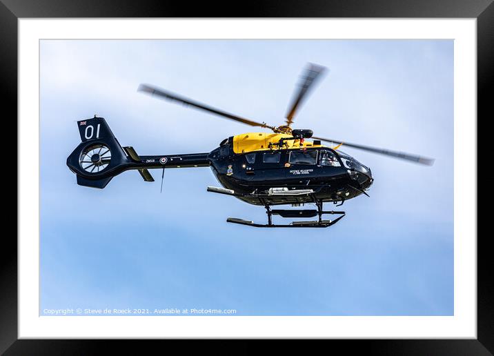 Helicopter Hovers Overhead Framed Mounted Print by Steve de Roeck
