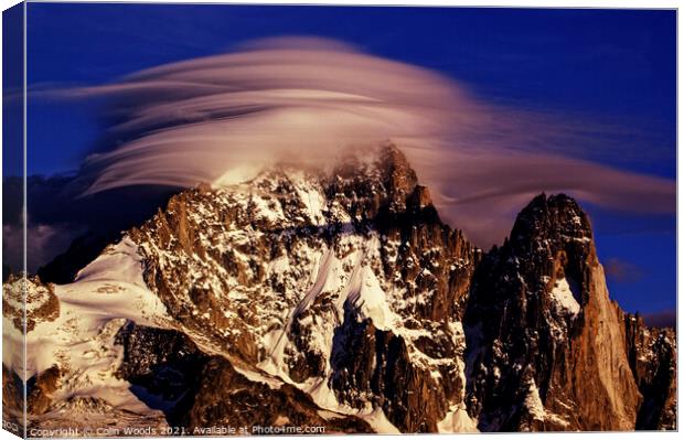 Dramatic clouds on the Aiguille Verte in the French Alps Canvas Print by Colin Woods