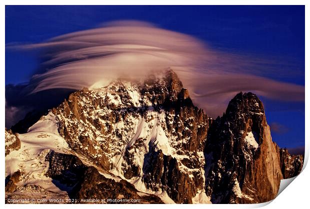 Dramatic clouds on the Aiguille Verte in the French Alps Print by Colin Woods