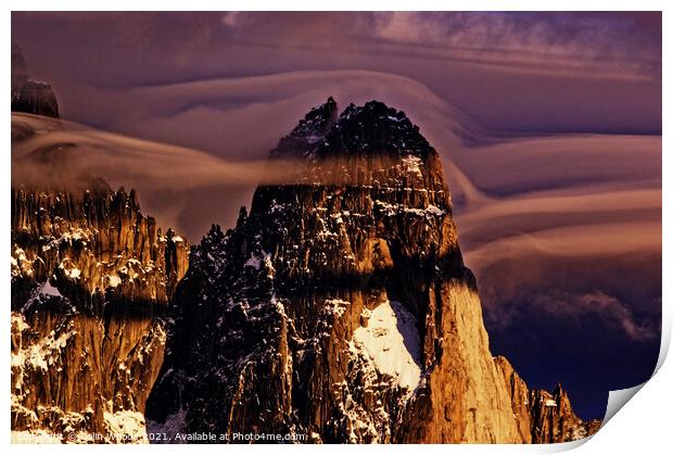 Clouds forming around the Aiguille de Dru in the French Alps Print by Colin Woods