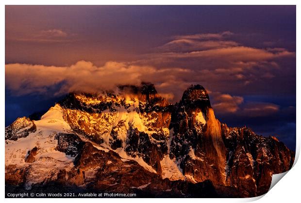 Clouds on the summit of the Aiguille Verte at Sunset Print by Colin Woods
