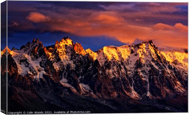 Fiery sunset light on the Chamonix Aiguilles in the French Alps Canvas Print by Colin Woods