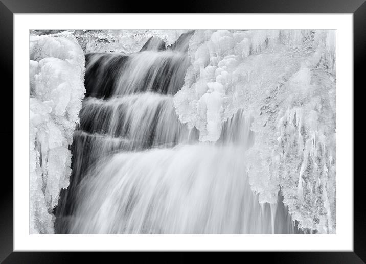 Icicles forming in a waterfall in Quebec, Canada Framed Mounted Print by Colin Woods