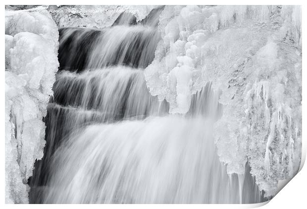 Icicles forming in a waterfall in Quebec, Canada Print by Colin Woods