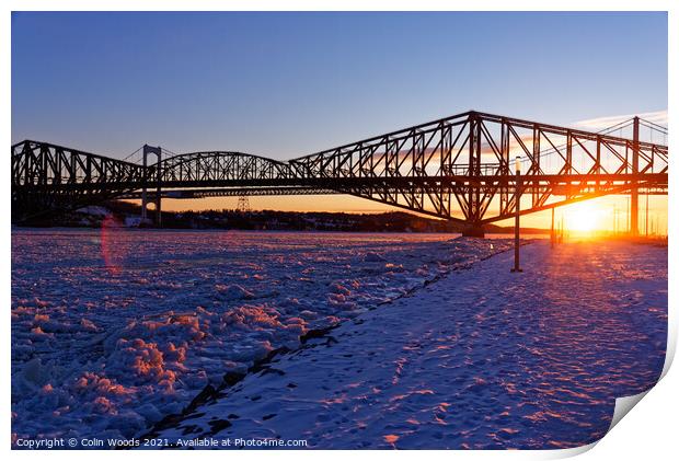 Sunset on the frozen St Lawrence river, Quebec Print by Colin Woods