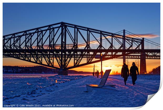 People walking by the frozen St Lawrence river in Quebec Canada Print by Colin Woods