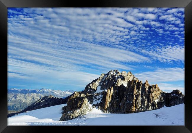 Outdoor mountainDramatic clouds over the Aiguille de Tour in the French Alps as seen from high on the Glacier du Tour, Chamonix, France Framed Print by Colin Woods