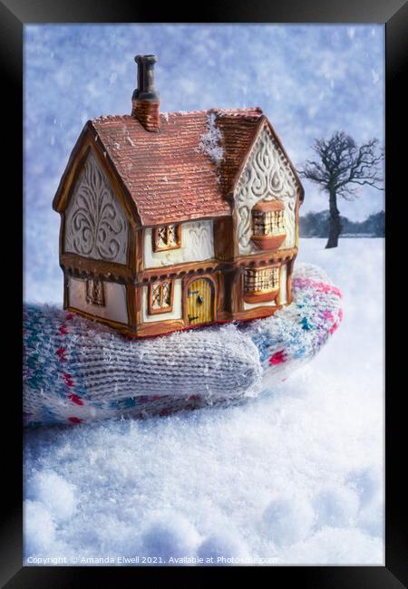 Winter Cottage In Gloved Hand Framed Print by Amanda Elwell