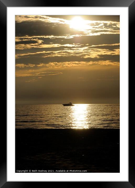 Boat at sunset Framed Mounted Print by Beth Rodney