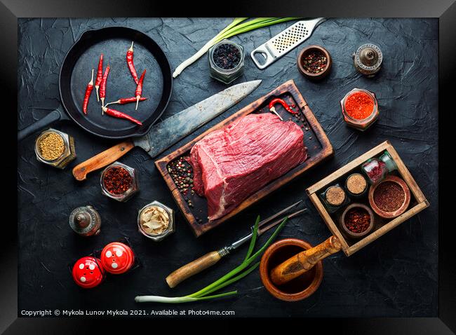 Raw veal meat with seasoning Framed Print by Mykola Lunov Mykola