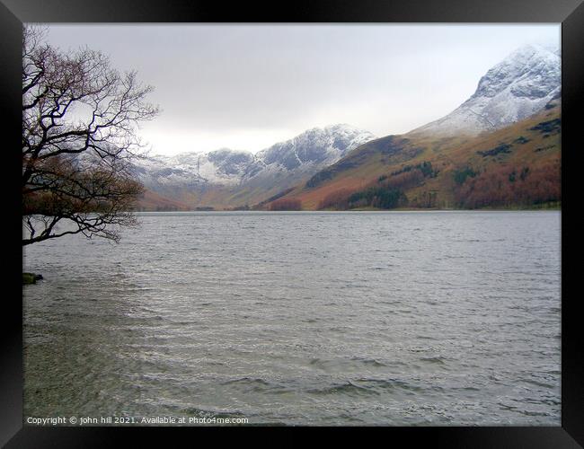 Buttermere Lake and haystack in the lake district Framed Print by john hill