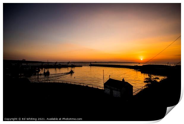 Sunrise at Newlyn Harbour as the first boat goes out. Print by Ed Whiting
