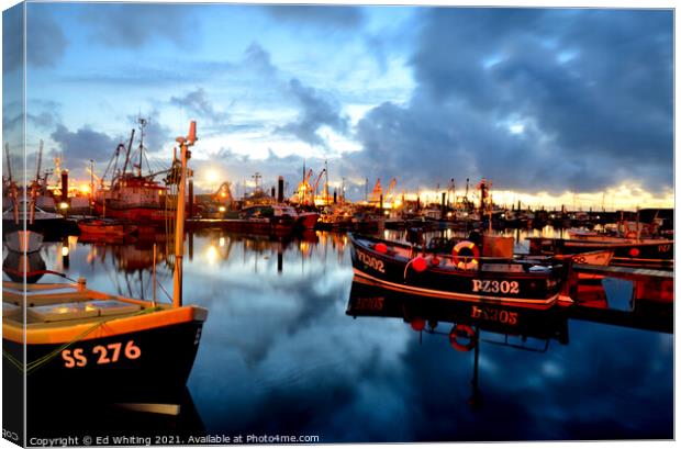 As morning breaks in Newlyn Harbour, Cornwall. Canvas Print by Ed Whiting
