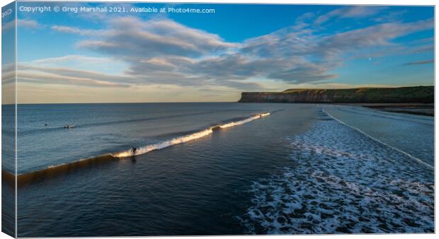 Surfers at Saltburn, Teesside / North Yorkshire at sunset. Canvas Print by Greg Marshall