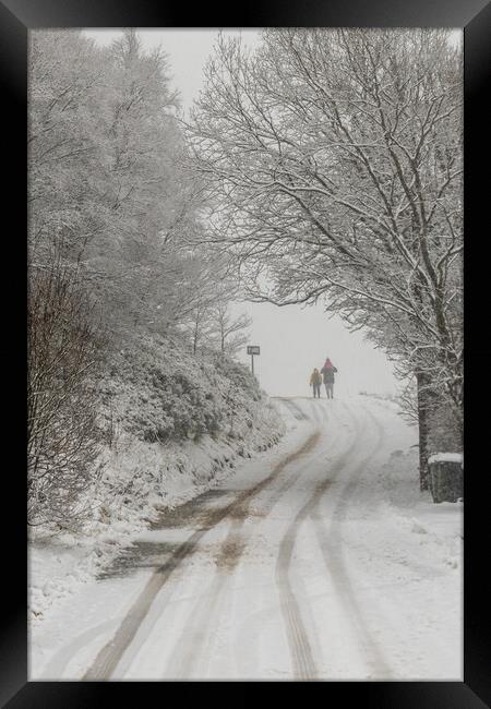 Snow covered roads Framed Print by chris smith