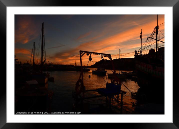 Brixham Harbour at sunset. Framed Mounted Print by Ed Whiting
