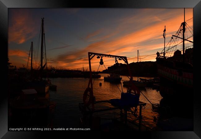Brixham Harbour at sunset. Framed Print by Ed Whiting