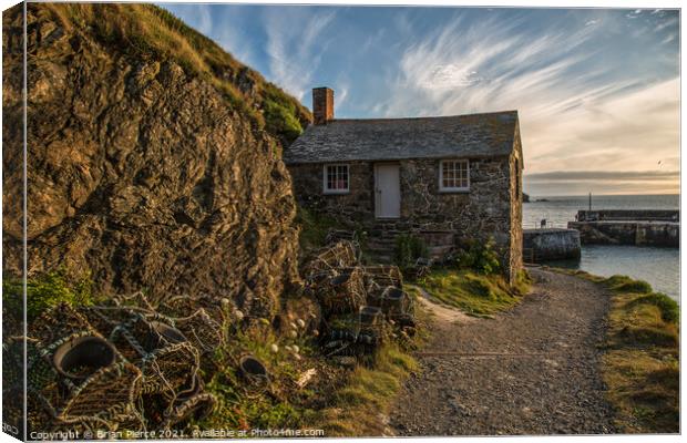 Lobster Pots and  the Old Net Loft, Mullion Cove Canvas Print by Brian Pierce