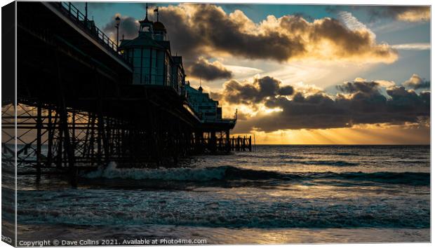 Sunrise and sunrays over Eastbourne Pier Canvas Print by Dave Collins