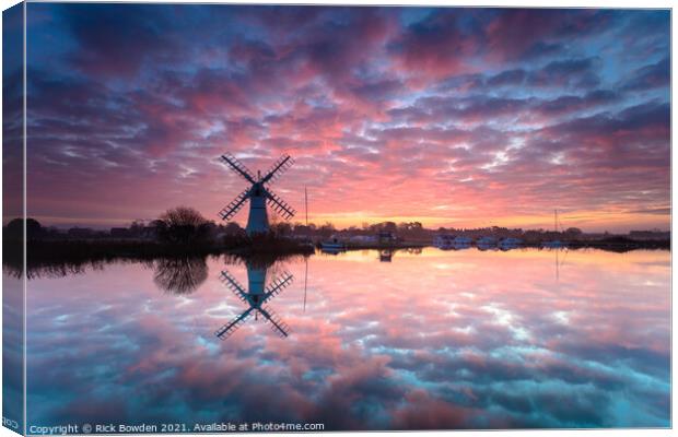 Fiery Sunrise over Thurne Mill Canvas Print by Rick Bowden