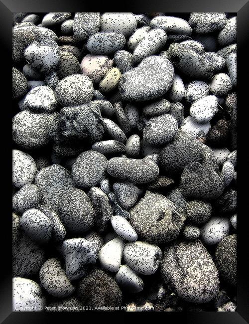 Abstract textured pebbles Framed Print by Peter Brownlow