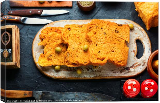 Freshly baked homemade bread Canvas Print by Mykola Lunov Mykola