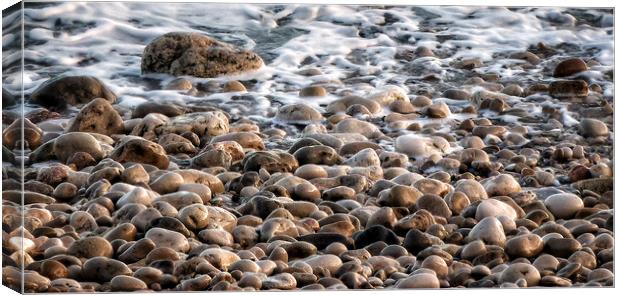 Pebbles on the Beach Canvas Print by Jacqui Farrell
