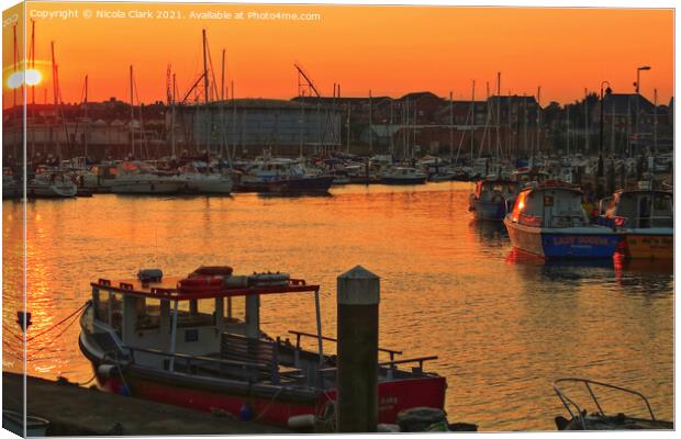 Majestic Sunset by the Marina Canvas Print by Nicola Clark