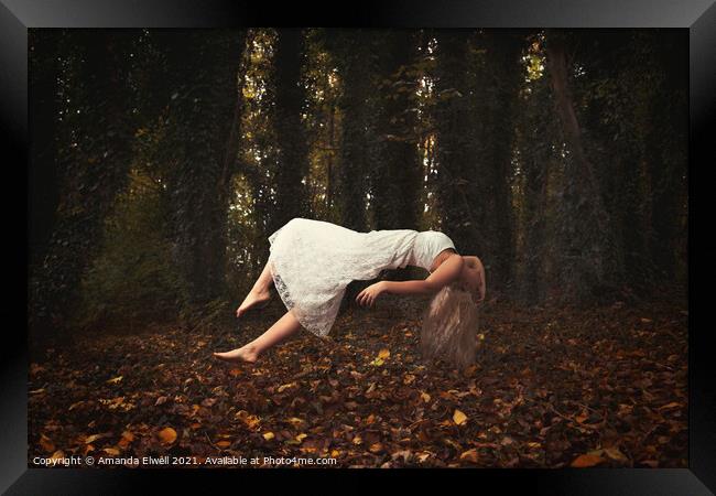 Levitating Woman With Blond Hair Framed Print by Amanda Elwell