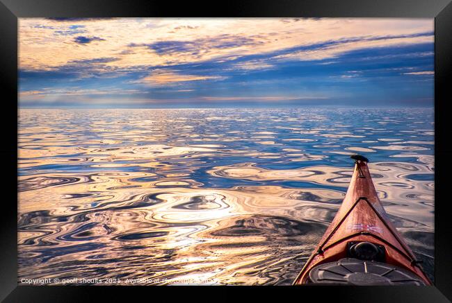 Paddling on a glassy evening Framed Print by geoff shoults