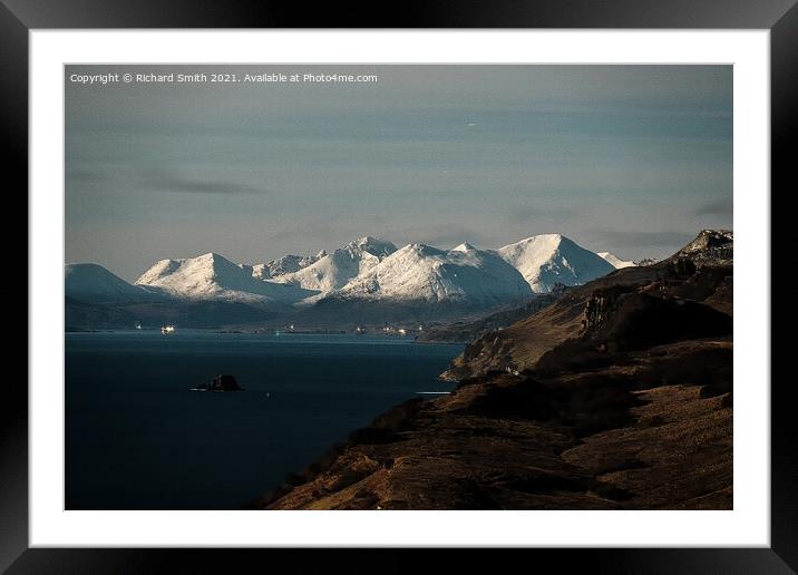 Snow covered Red Cuillin Hills beyond the Sound of Raasay. Framed Mounted Print by Richard Smith