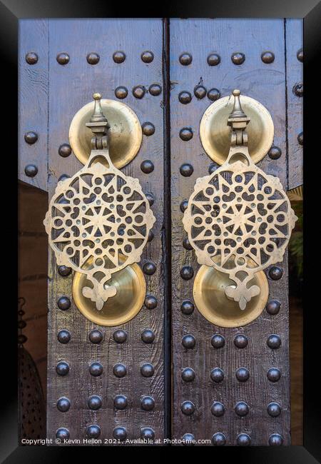 Ornate brass doorknockers Framed Print by Kevin Hellon
