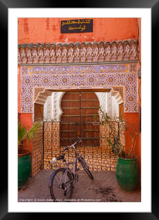 Moroccan doorway and bicycle Framed Mounted Print by Kevin Hellon