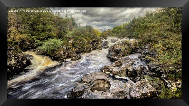 The fast flowing river through Glen Orchy Framed Print by Derek Daniel