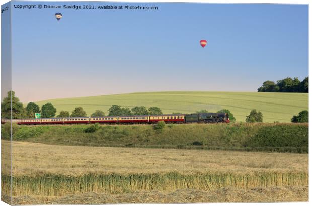 Steam train v the hot air balloon  Canvas Print by Duncan Savidge