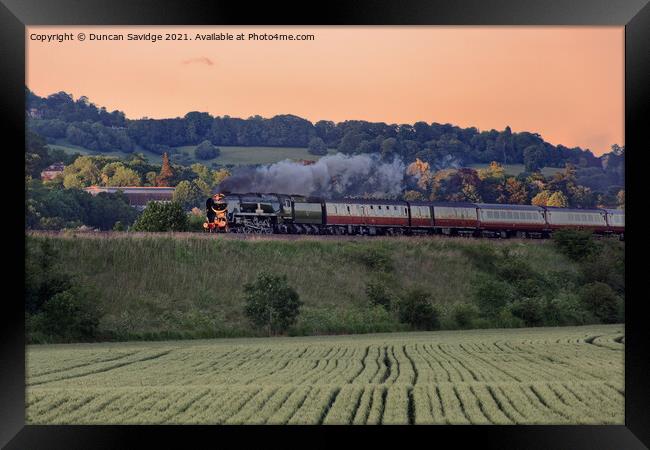 Steam train in the late evening sun Framed Print by Duncan Savidge