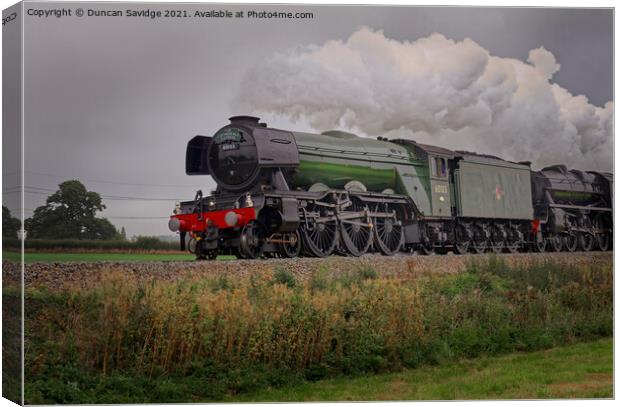 Flying Scotsman steam train with black 5 moody clo Canvas Print by Duncan Savidge