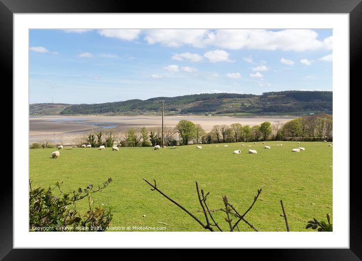 View across fields to Red Wharf Bay in Anglesey, W Framed Mounted Print by Kevin Hellon