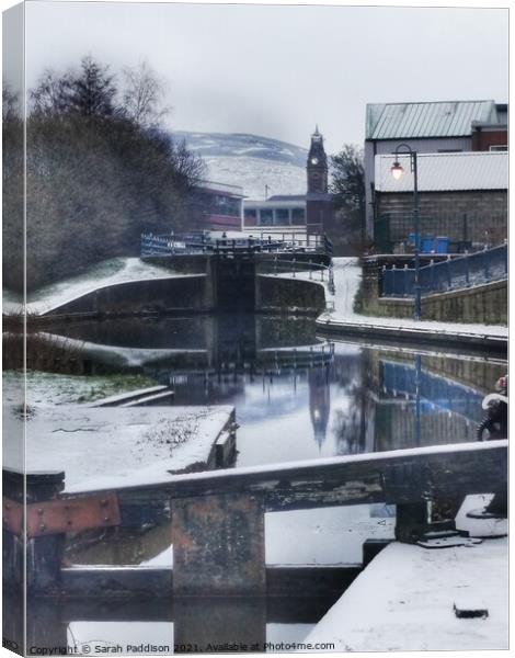 Stalybridge reflecting in the Canal Canvas Print by Sarah Paddison