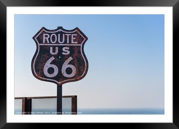 Route 66 sign, set against a clear blue sky Framed Mounted Print by Gary Parker
