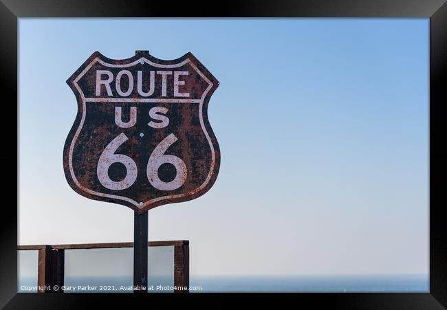Route 66 sign, set against a clear blue sky Framed Print by Gary Parker