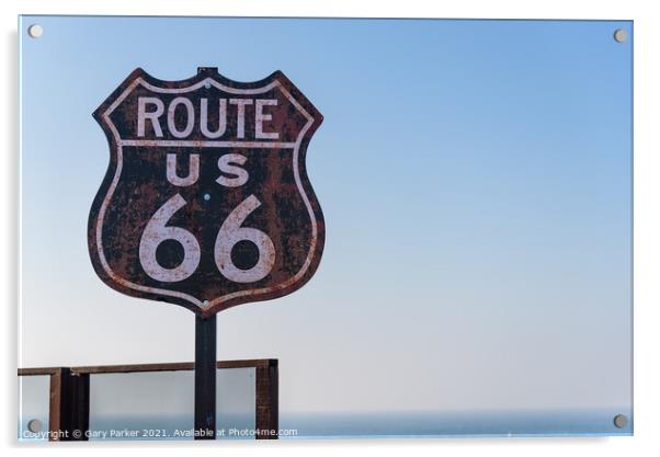 Route 66 sign, set against a clear blue sky Acrylic by Gary Parker