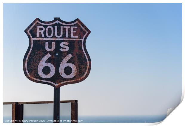 Route 66 sign, set against a clear blue sky Print by Gary Parker