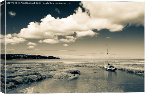 Old Boat in Red Wharf Bay Anglesey Canvas Print by Pearl Bucknall