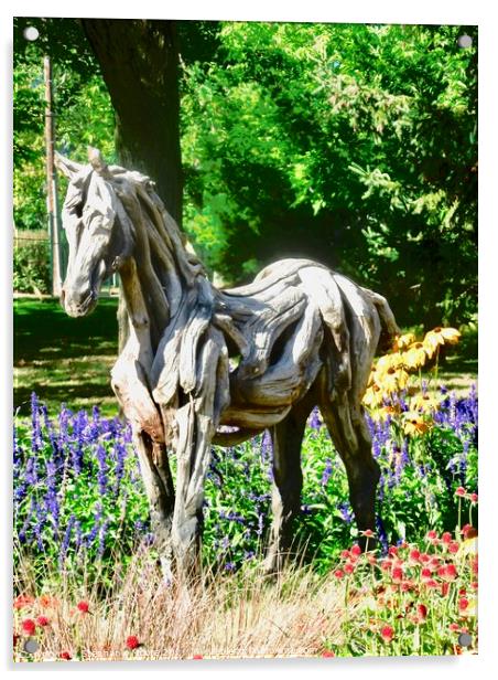 A wooden horse standing in flowers Acrylic by Stephanie Moore