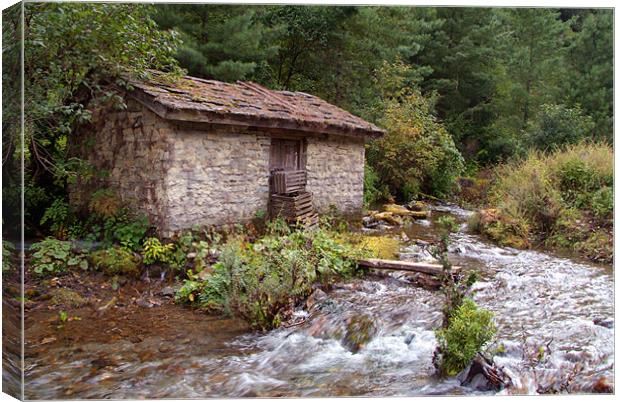 Stone Building by River near Chame Canvas Print by Serena Bowles