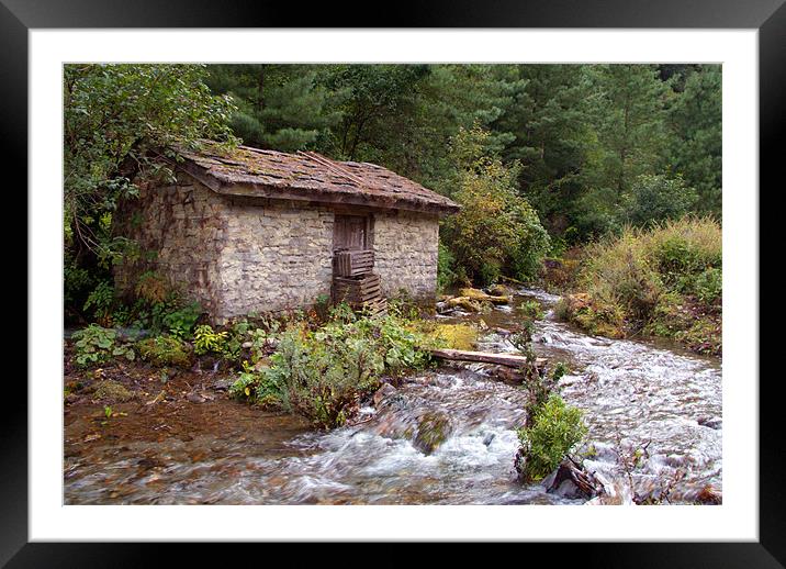 Stone Building by River near Chame Framed Mounted Print by Serena Bowles