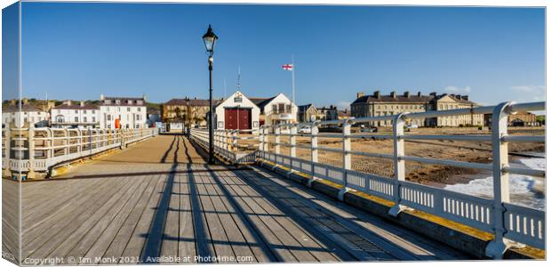 Beaumaris Pier, Anglesey Canvas Print by Jim Monk